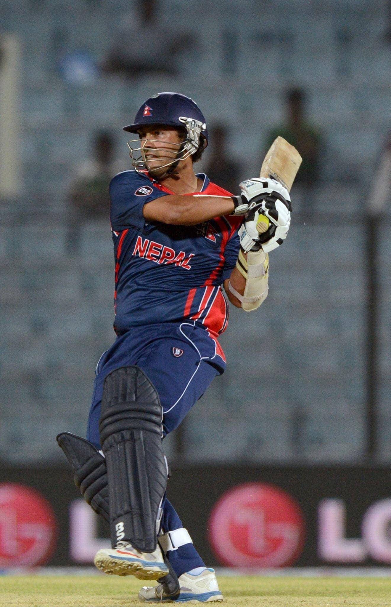 Subash Khakurel playing a pull shot in a Nepal jersey